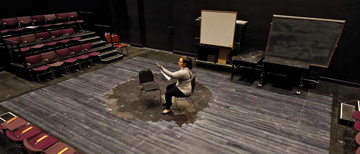 Theatre Arts student rehearsing her lines on the classroom stage